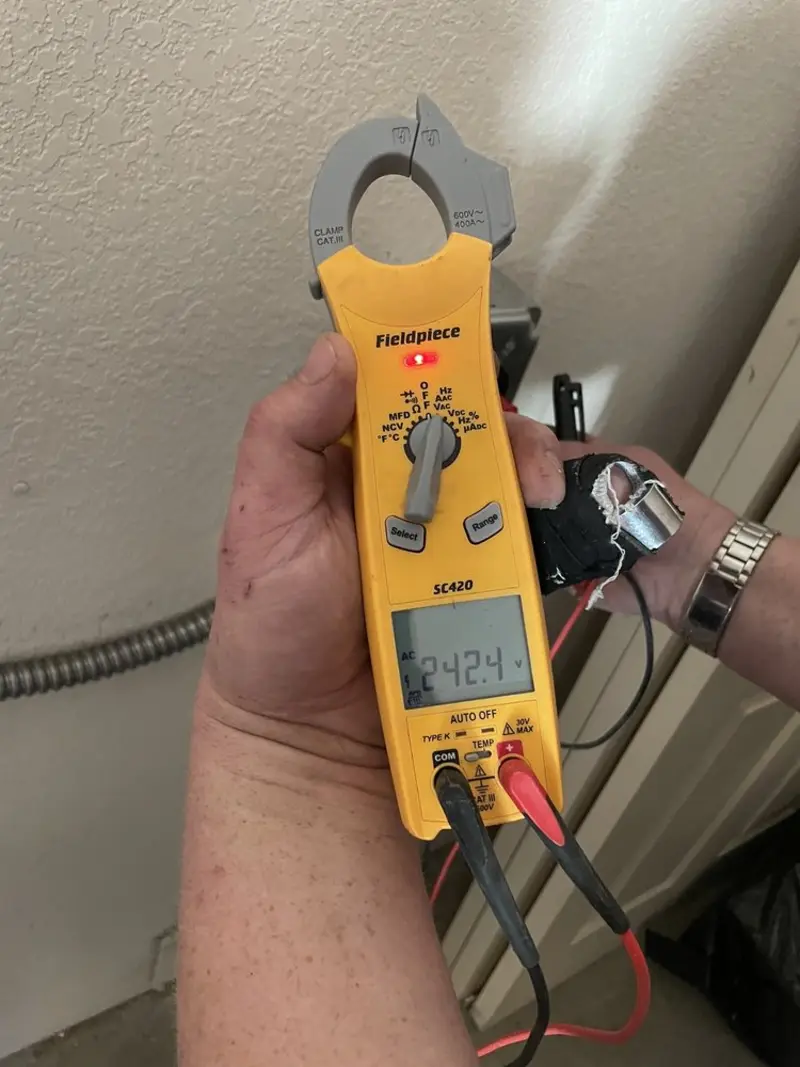 Voltage testing with clamp meter during Generator Installation in Esparto